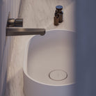 Mineralguss-Waschbecken OVO M+ mit integriertem Pop-up-Verschluss – stilvolles Aufsatzwaschbecken für moderne Waschtische